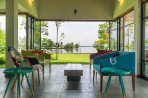 Cheppanam House with Backwater View and Pvt Lawn by StayVista